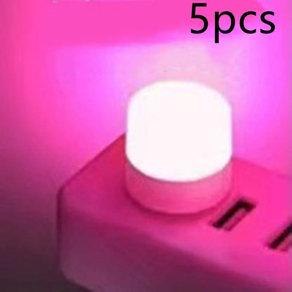 Compact USB LED night light with soft glow for reading and sleep