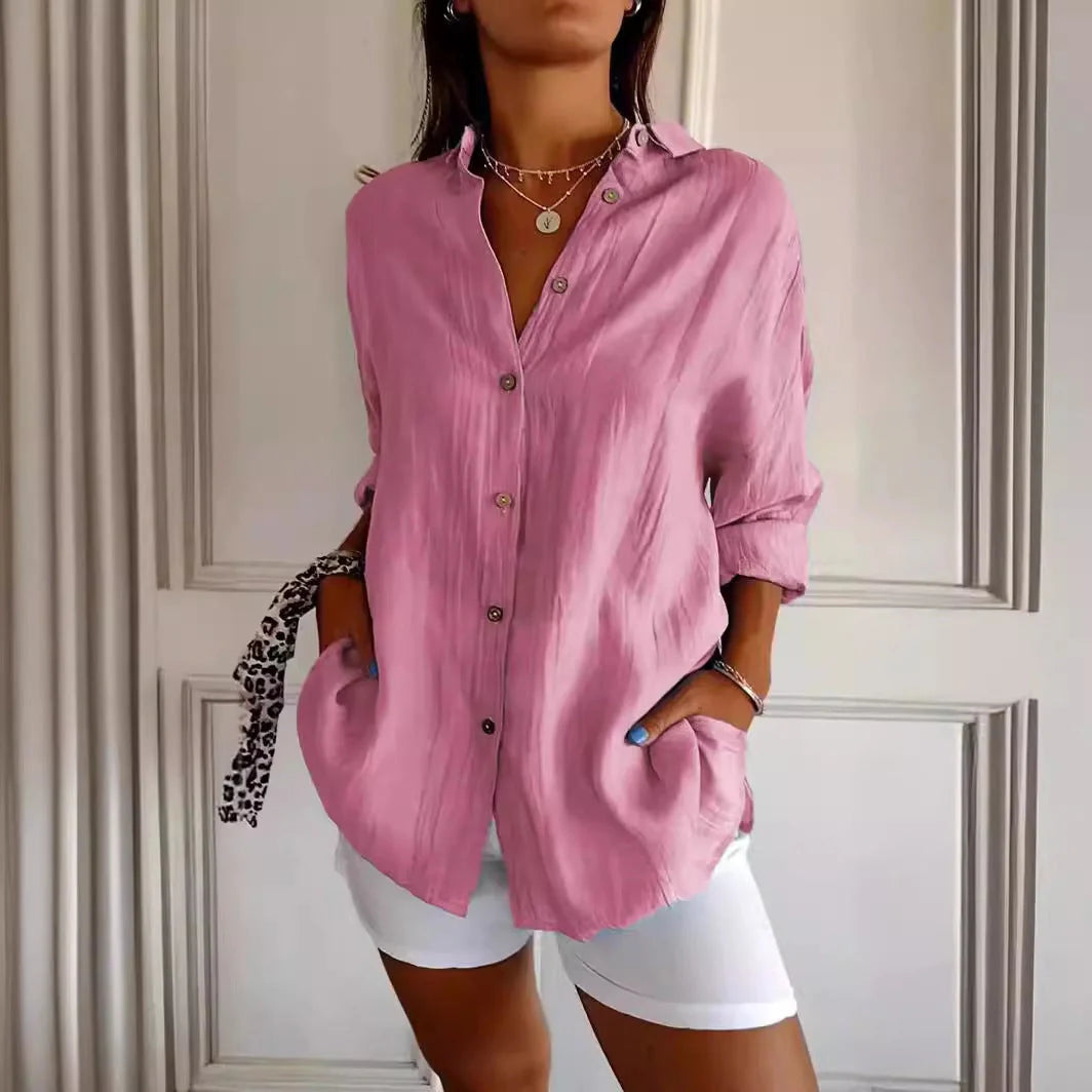 A stylish long-sleeved shirt with a pleated design, available in a variety of colours to suit any occasion.