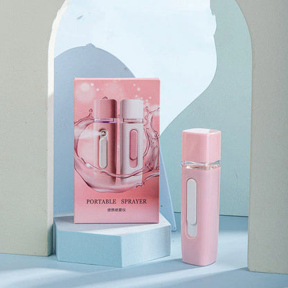 Portable facial mister with 38ml water tank, transforms water into fine mist for hydrating skin on the go