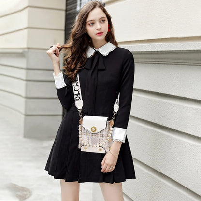 Premium crossbody phone bag with elegant pearl charm, made of durable PU leather and available in multiple color options