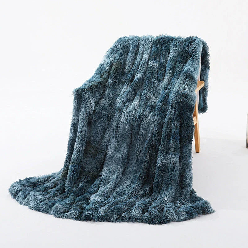 Cosy and luxurious faux fur throw blanket in a variety of colours and sizes, perfect for adding warmth and style to your living space