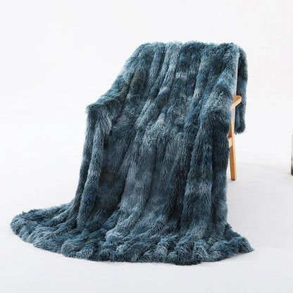 Cosy and luxurious faux fur throw blanket in a variety of colours and sizes, perfect for adding warmth and style to your living space