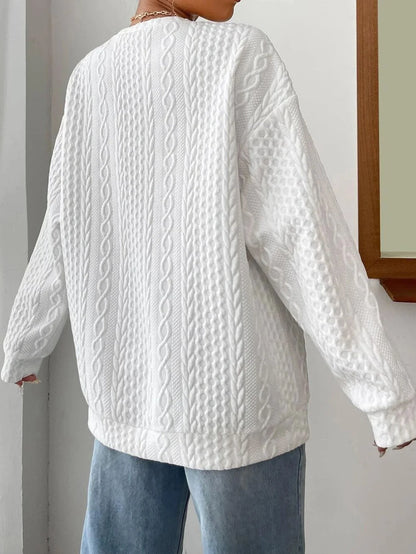 Cosy and stylish women's oversized jacquard hoodie in black, white, and blue colours