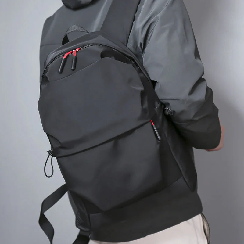 Stylish nylon backpack with multiple compartments for everyday use