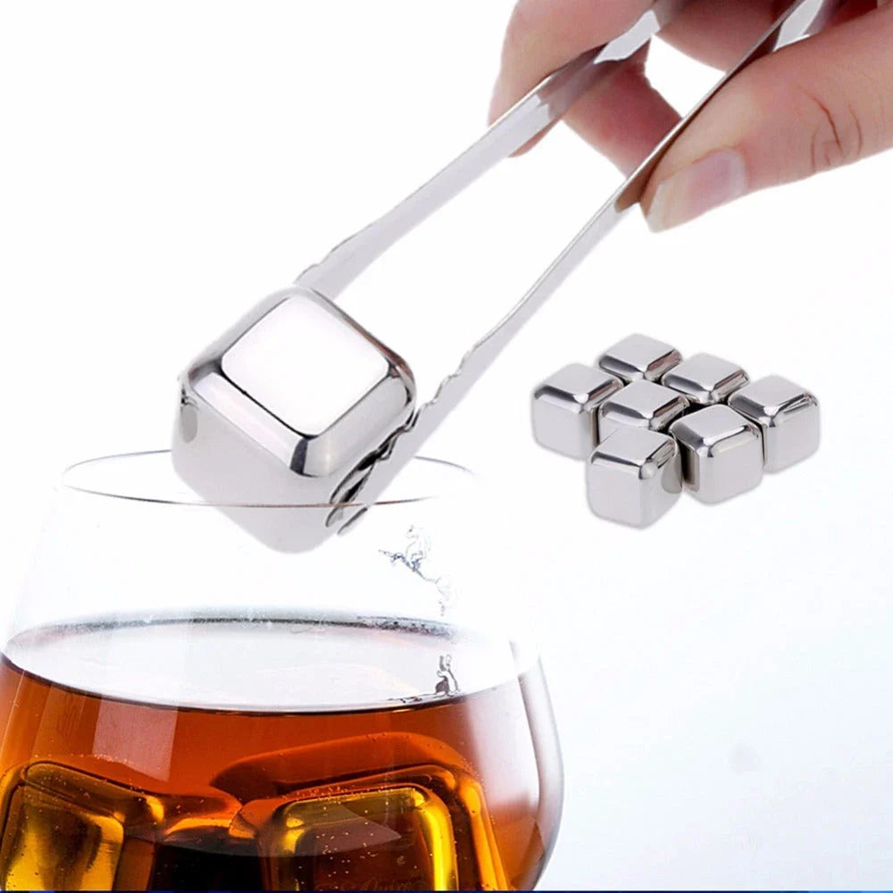 Premium stainless steel whisky chilling stones set in various shapes and sizes, including square, circular, heart, and diamond-shaped stones