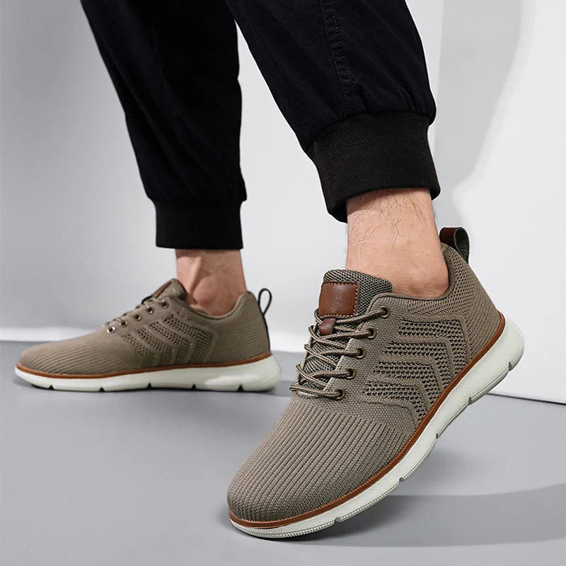 Men's black lace-up mesh sneakers with round toe design