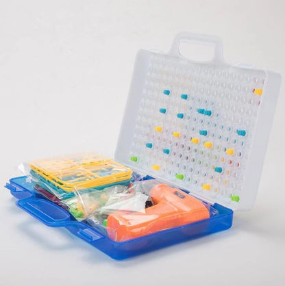 Educational building kit with safe plastic power drill for children aged 3+