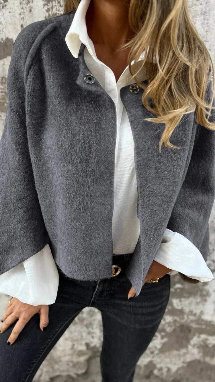 A stylish and comfortable batwing sleeve cardigan made with luxurious imitation cashmere fabric, available in a variety of colors.