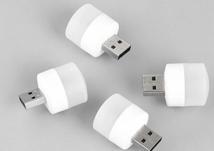 Compact USB LED night light with soft glow for reading and sleep