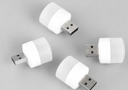 Compact USB LED night light with soft glow for reading and sleep