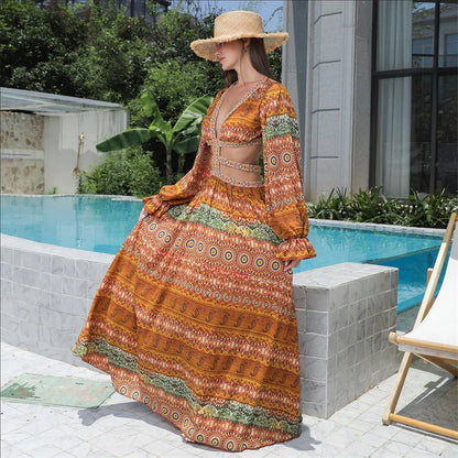 Elegant Women's Floral Long Sleeve Dress in vibrant orange, perfect for spring and summer occasions.