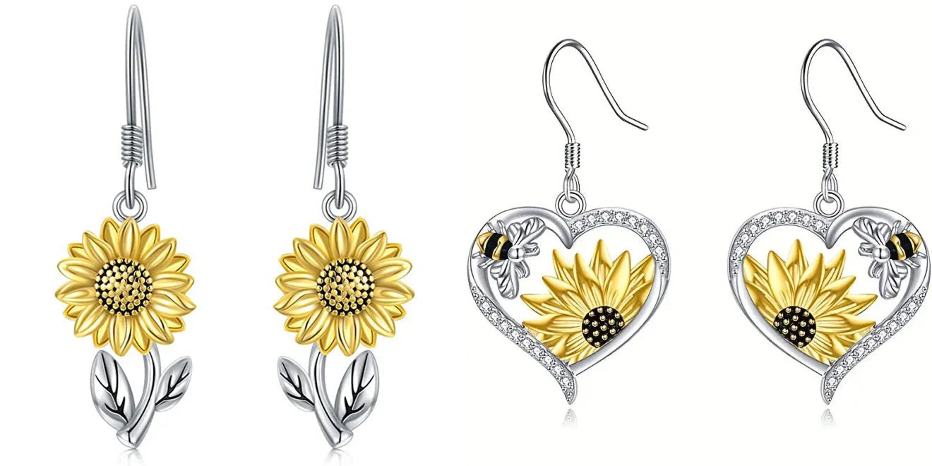 Elegant silver earrings featuring delicate bee and sunflower motifs, a stunning fashion accessory with natural charm.