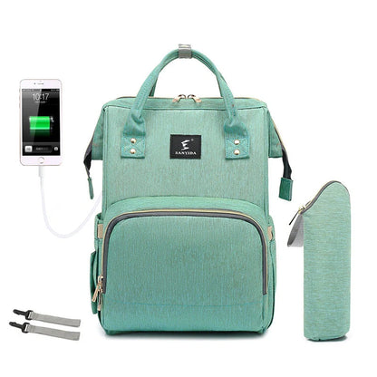 Portable folding crib and mummy bag in green and grey, compact design for baby travel