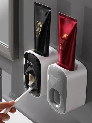Wall-mounted automatic toothpaste dispenser with storage cups for toothbrush and bathroom accessories