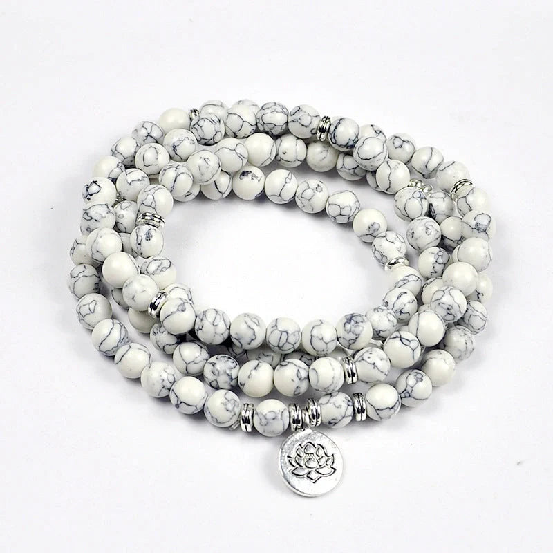 Premium handcrafted meditation bracelet with genuine Tiger's Eye stones, 108 beads, and a lotus charm