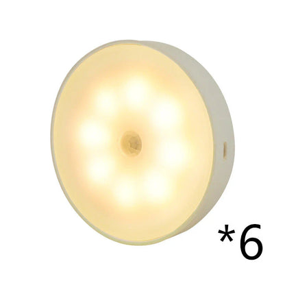 Motion-activated LED puck lights in warm and white color options, with various pack sizes and USB recharging