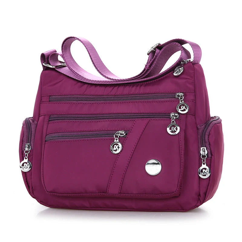 Ladies waterproof nylon oxford crossbody bag in various colors with multi-layer storage