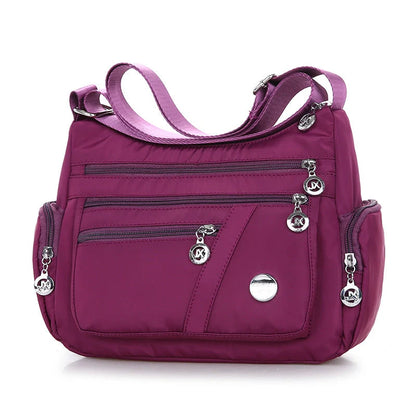 Ladies waterproof nylon oxford crossbody bag in various colors with multi-layer storage