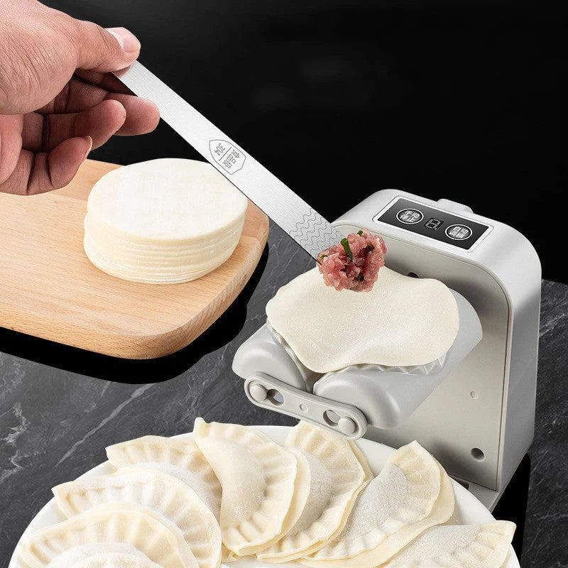 Electric Dumpling Maker Machine in white, compact and efficient for kitchen use