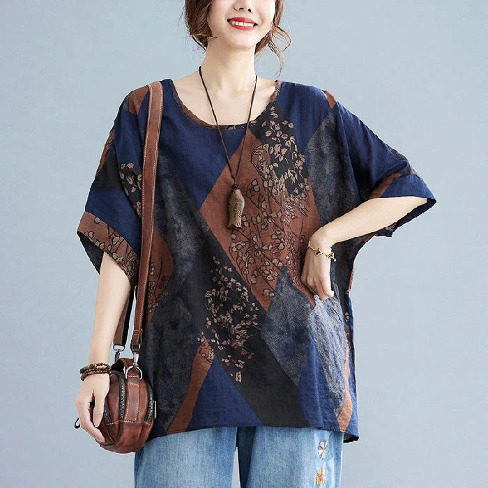 Stylish loose fit women's t-shirt in retro print with vibrant colours of yellow, red, and brown