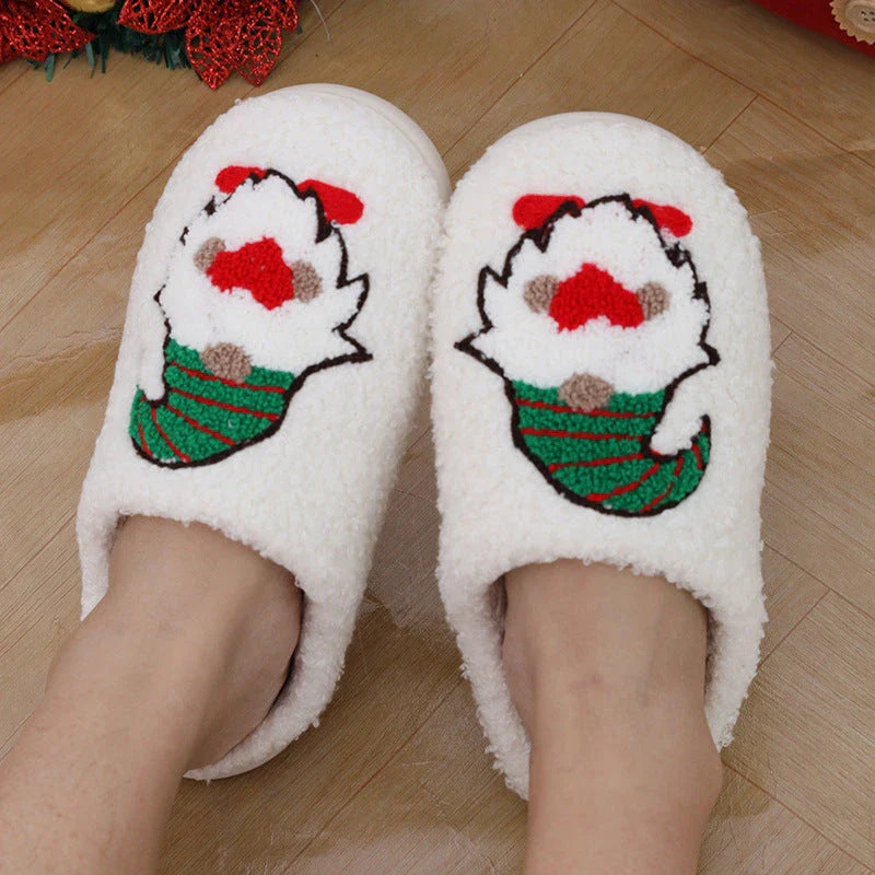 Cozy Christmas-themed slip-on slippers with a charming Santa Claus design, perfect for indoor comfort and warmth during the holiday season.