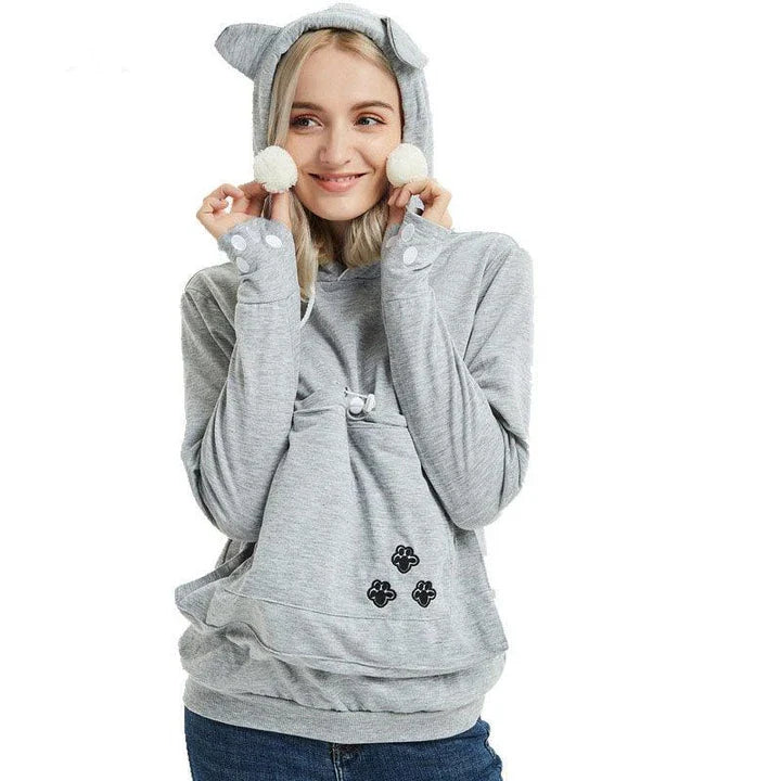 Cosy and cute hoodies with pet pocket for women to keep their cats warm and snug during the British winter
