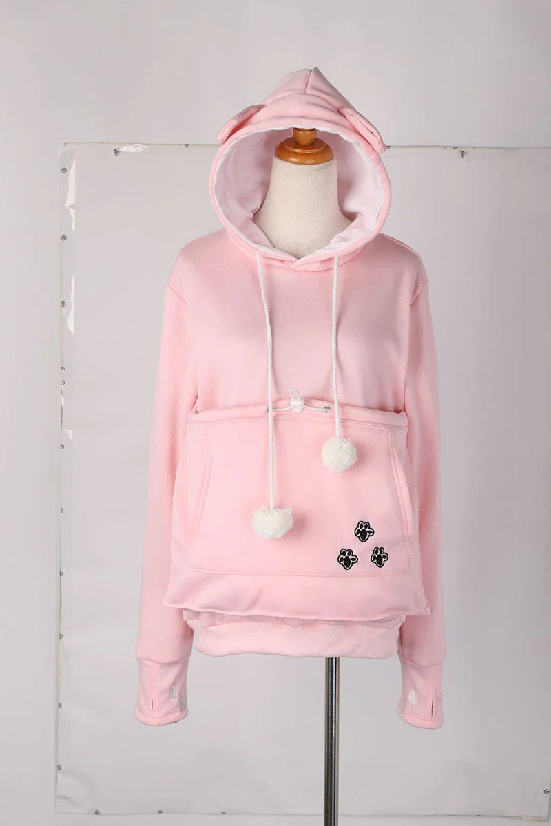 Cosy and cute hoodies with pet pocket for women to keep their cats warm and snug during the British winter