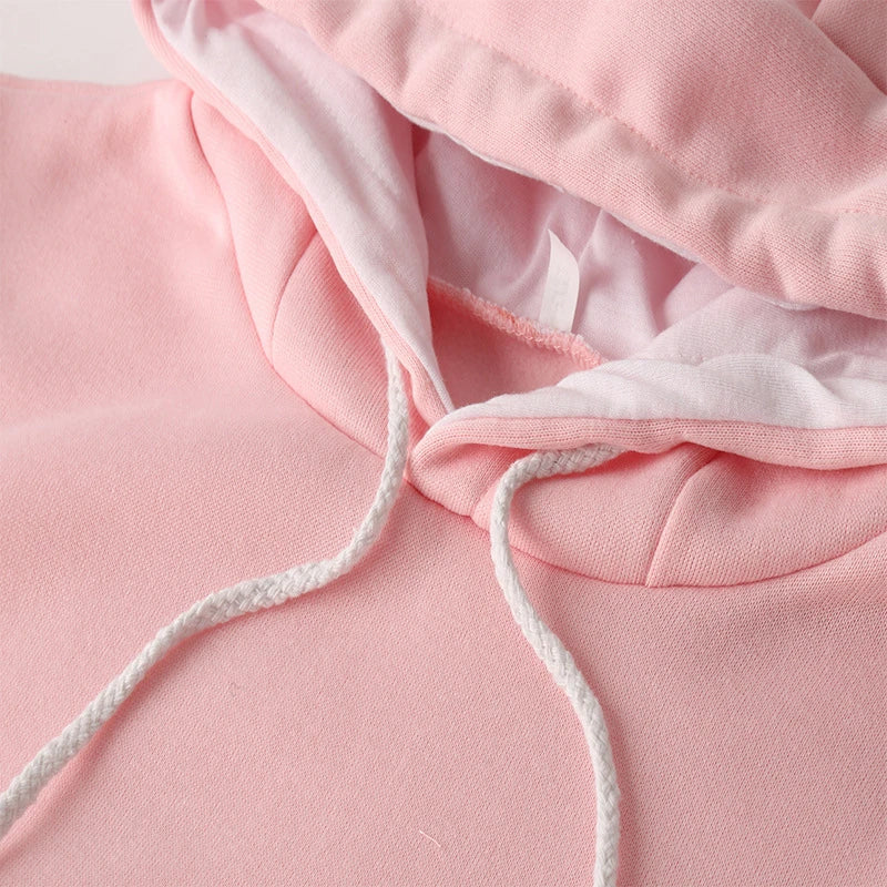 Cosy and cute hoodies with pet pocket for women to keep their cats warm and snug during the British winter