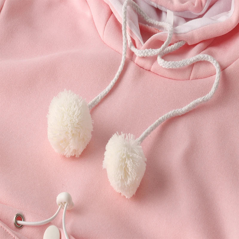 Cosy and cute hoodies with pet pocket for women to keep their cats warm and snug during the British winter