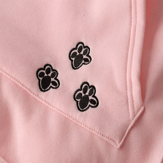 Cosy and cute hoodies with pet pocket for women to keep their cats warm and snug during the British winter