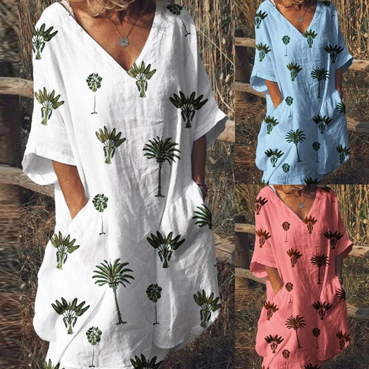 Trendha Leaf Print V-Neck Casual Flared Dress in blue with a vibrant leaf pattern, v-neck, and flared skirt design