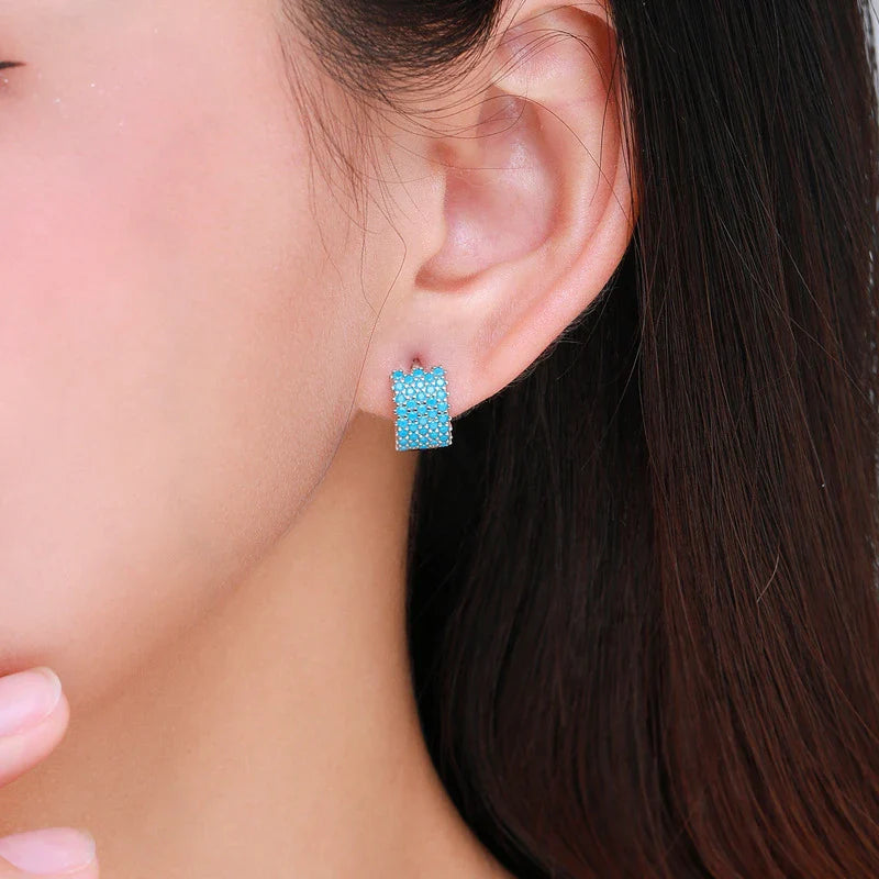 Elegant silver ear hoops with a simple and contemporary design for the stylish woman