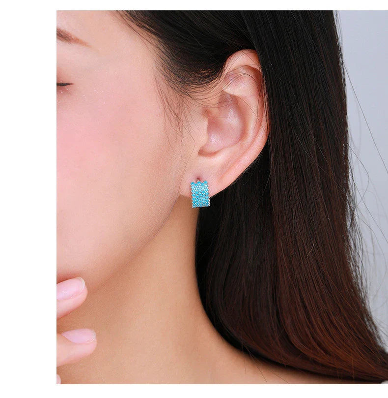 Elegant silver ear hoops with a simple and contemporary design for the stylish woman