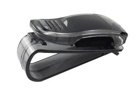 A compact plastic clip that securely holds sunglasses or glasses on a car's sun visor