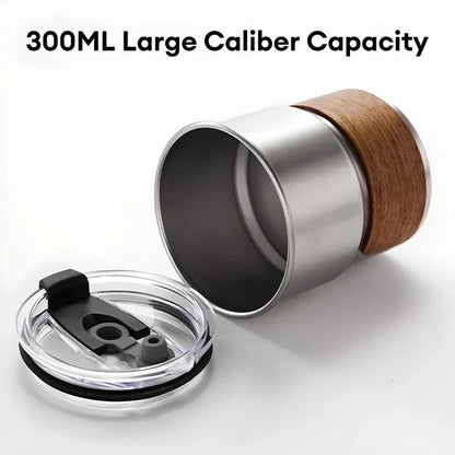 Portable stainless steel camping coffee mug with wooden lid and splash-proof design