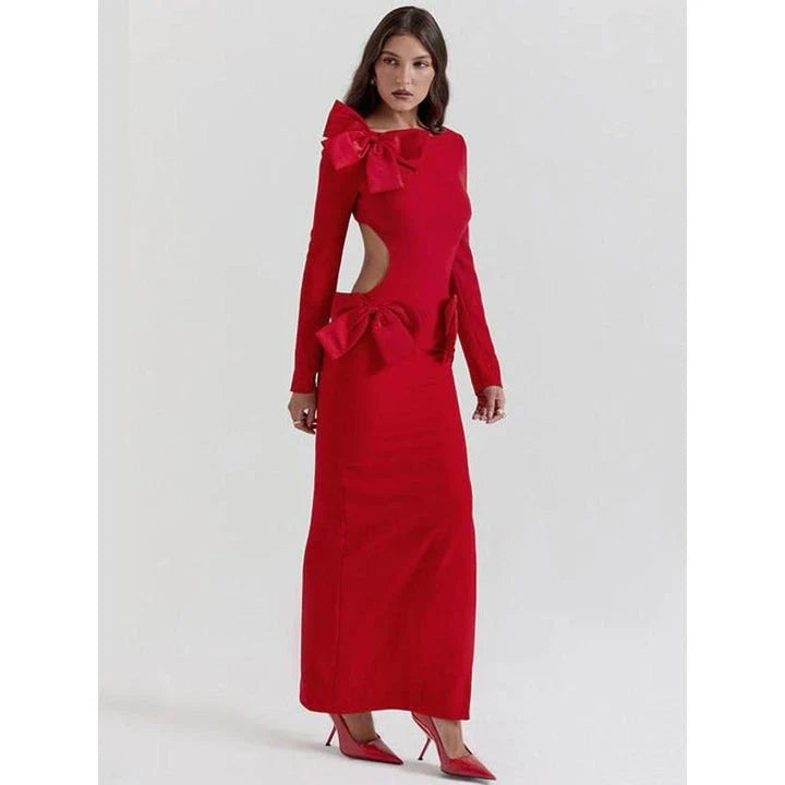 Elegant red maxi dress with backless design and bow detail, perfect for formal events and parties