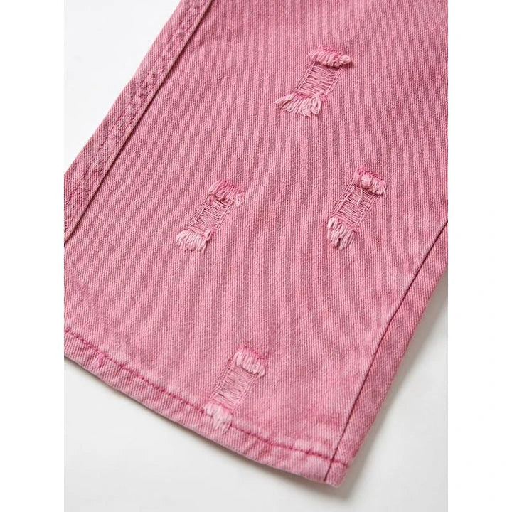 Photograph of a model wearing pink high-waisted, wide-leg jeans with vintage-inspired details