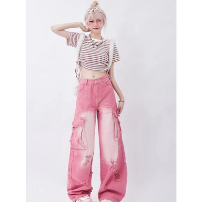 Photograph of a model wearing pink high-waisted, wide-leg jeans with vintage-inspired details