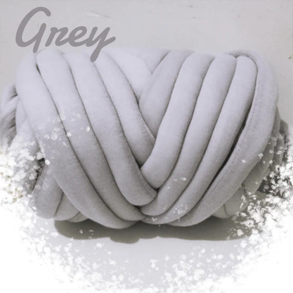 Soft, chunky hand knitting tube yarn in various colours, perfect for DIY projects like blankets, cushions, and pet beds