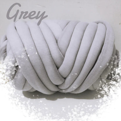 Soft, chunky hand knitting tube yarn in various colours, perfect for DIY projects like blankets, cushions, and pet beds