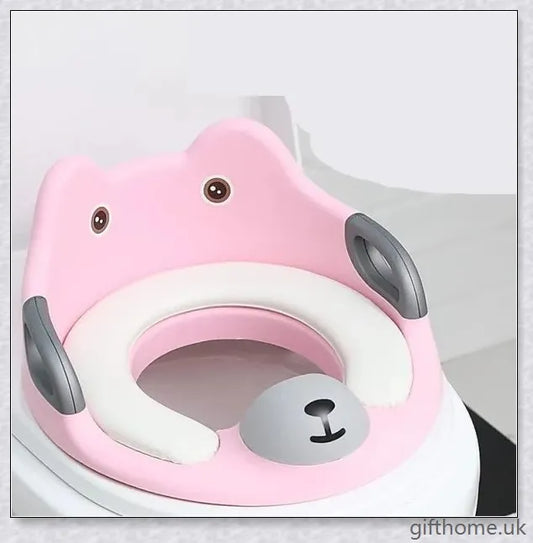 A soft, spongy toilet seat in a charming bear-themed design, providing comfort and safety for your child's bathroom.