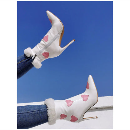 Stylish patent leather peach-coloured pointed toe heels, perfect for Halloween