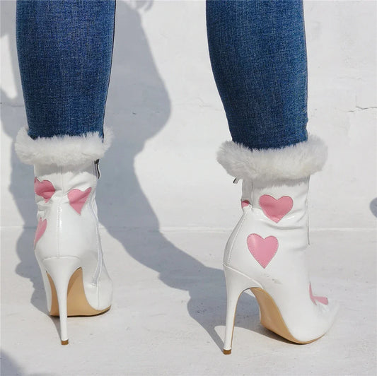 Stylish patent leather peach-coloured pointed toe heels, perfect for Halloween
