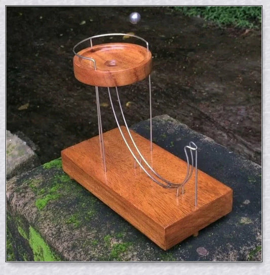 Perpetual Motion Marble Machine - A captivating desk toy that showcases the wonders of physics and engineering.