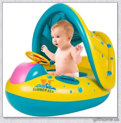 A baby swimming in a blue and white clamshell-style inflatable swimming pool float with a sun canopy and steering wheel