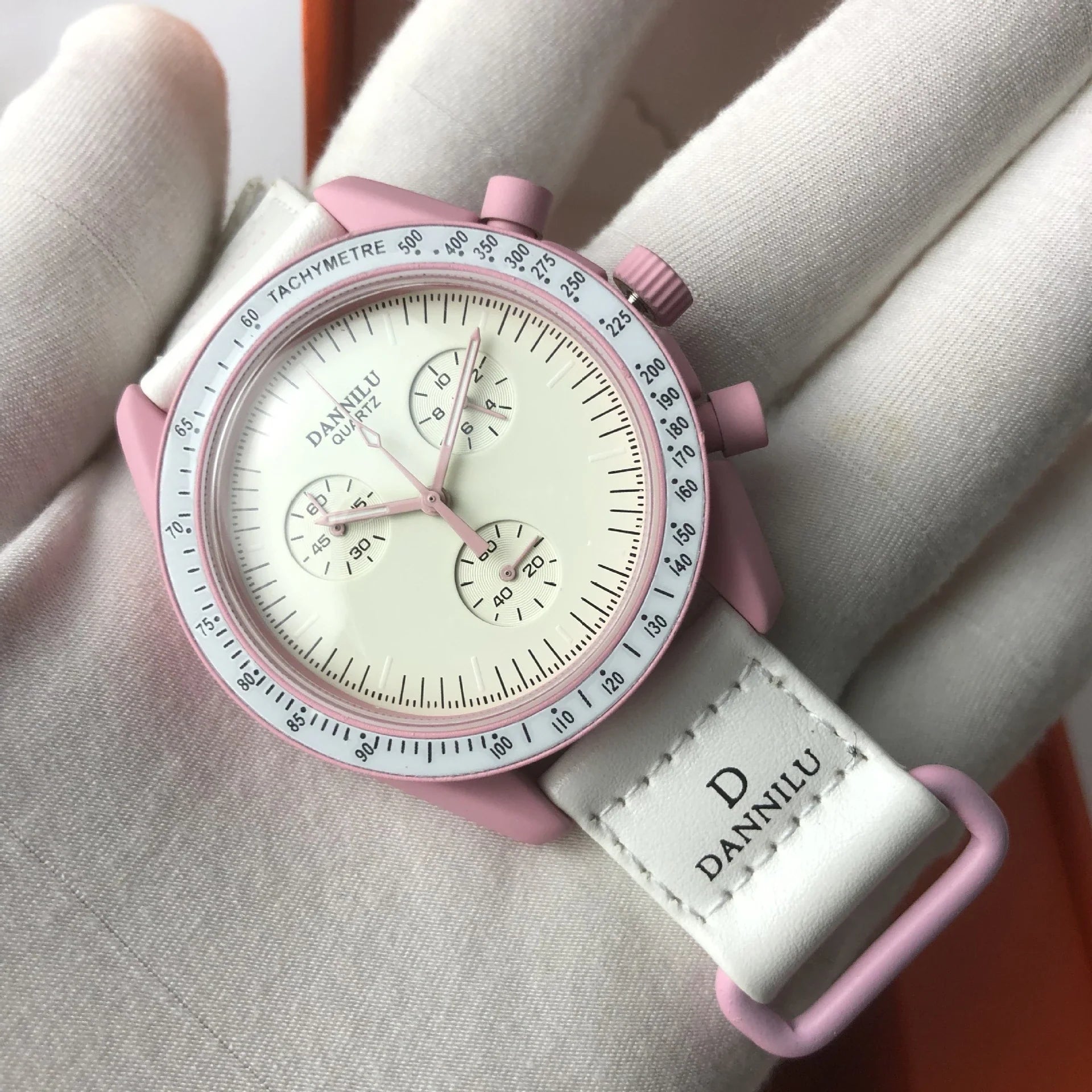 Sophisticated multi-function quartz watch with stylish textile strap, featuring a classic round dial and stainless steel clasp