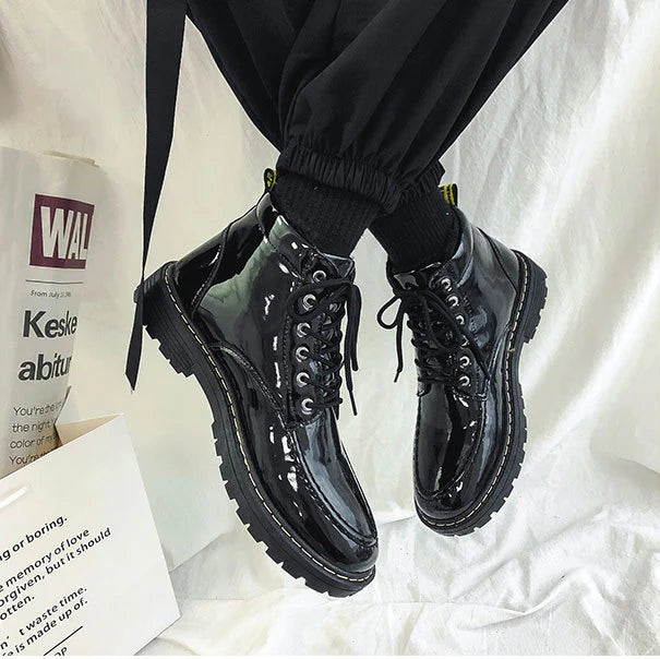 Stylish and comfortable high-top shoes with a glossy, shiny finish and durable rubber sole for everyday wear