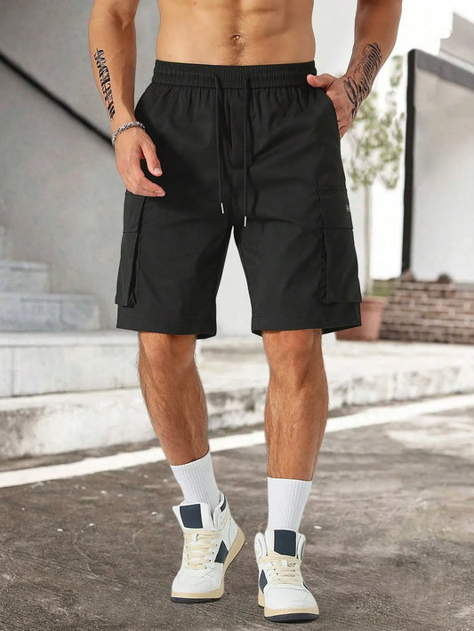 Drawstring waist men's multi-pocket workwear shorts in various colours, designed for comfort and functionality on the job site or for DIY projects.