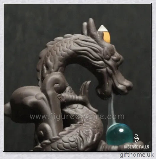 Handcrafted ceramic incense burner with a dragon design and a mesmerising gem at the centre, creating a smoky waterfall effect to diffuse calming aromas.