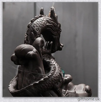 Handcrafted ceramic incense burner with a dragon design and a mesmerising gem at the centre, creating a smoky waterfall effect to diffuse calming aromas.